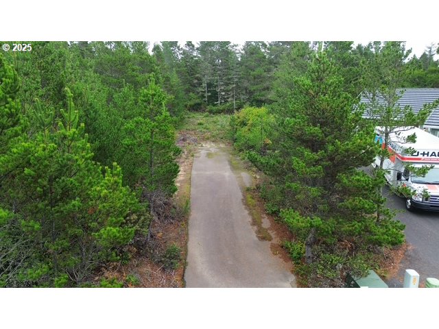 4 Bonnett Way Florence, OR 97439 - Photo 2 of 17 a black and white photo of a park