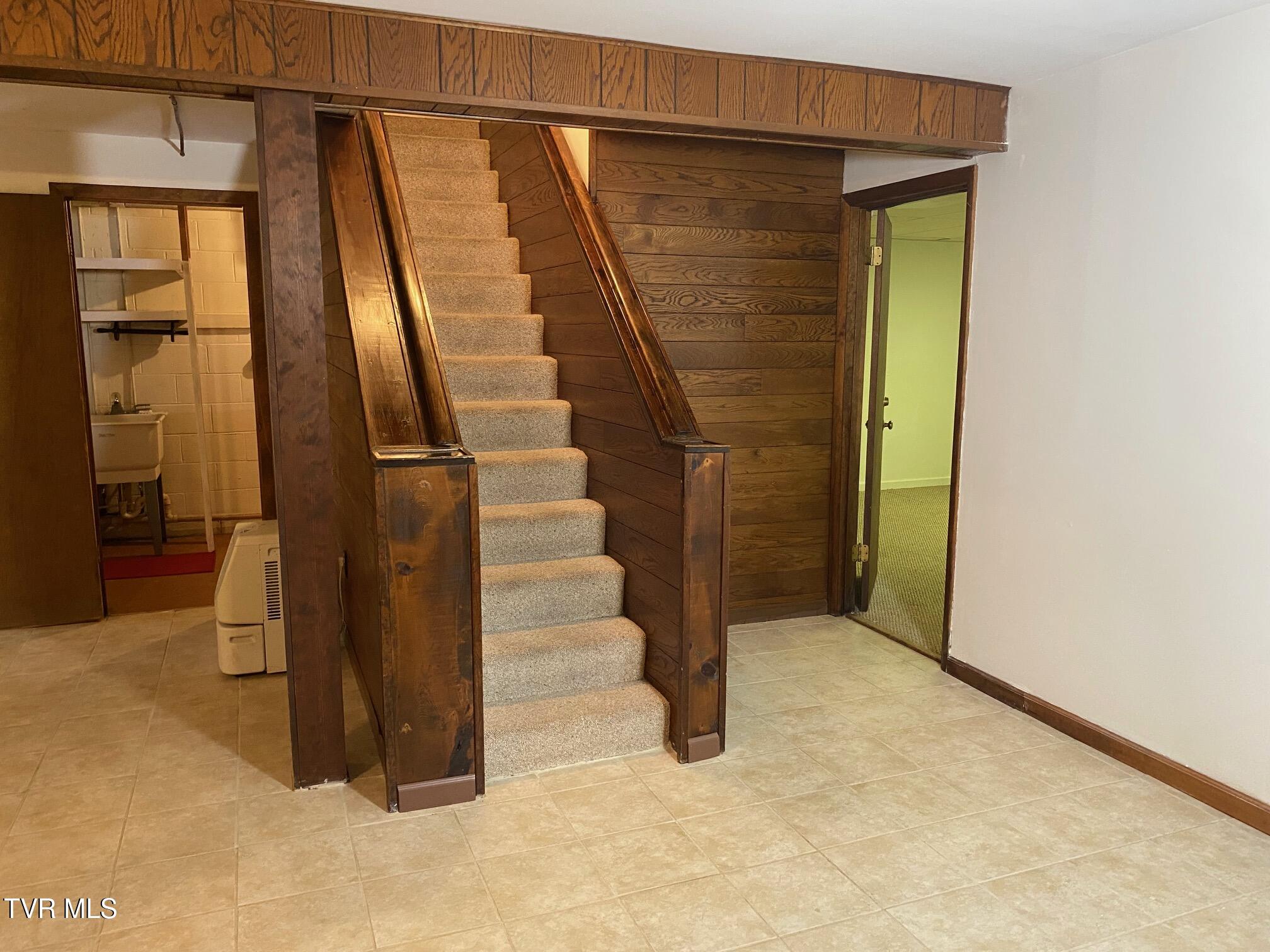 3204 Marbleton Road Unicoi, TN 37692 - Photo 66 of 114 Basement steps, utility room to the left