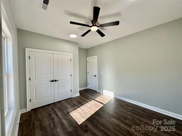 a view of workspace with wooden floor