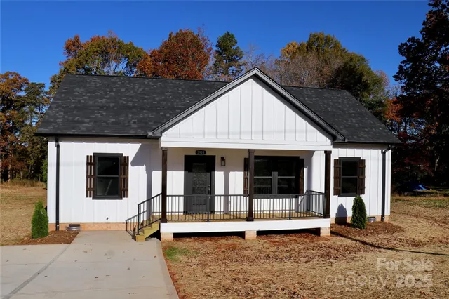 a front view of a house with a porch