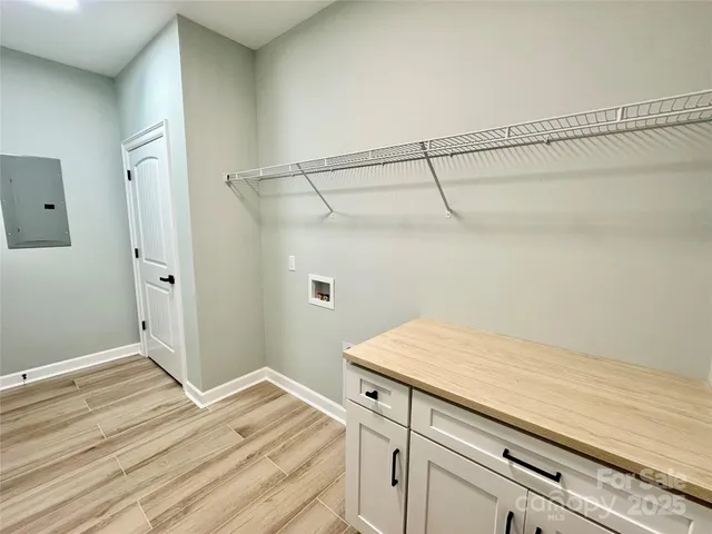 a bathroom with a sink and vanity