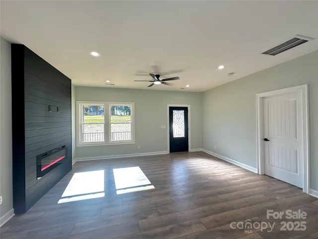 a view of livingroom with hardwood floor and window