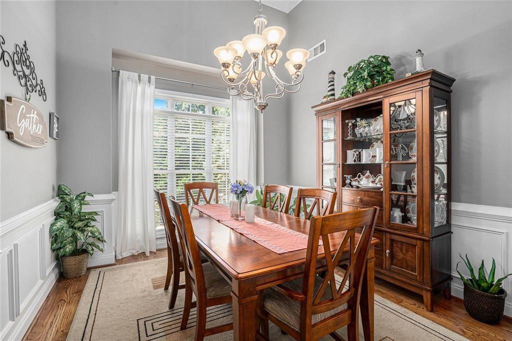 3792 Falls Trail Winston, GA 30187 - Photo 7 of 33 a view of a dining room with furniture window and wooden floor