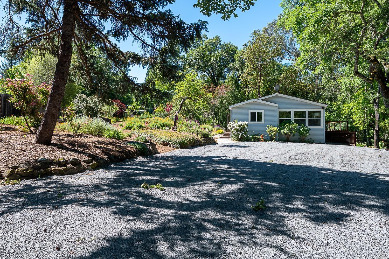 9903 Graton Road Sebastopol, CA 95472 - Photo 1 of 1 a front view of a house with a yard