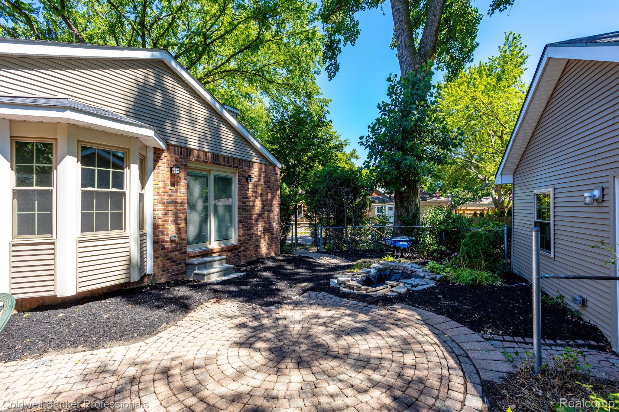 459 La Belle Road Grosse Pointe, MI 48236 - Photo 28 of 29 Patio with a Pond