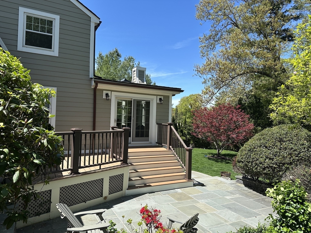 45 Wellesley Road Belmont, MA 02478 - Photo 37 of 42 a view of a patio with two chairs and a flower pot