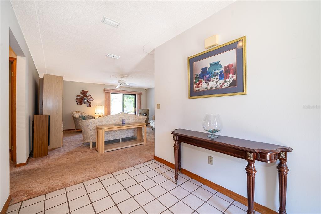 14604 Southwest 45th Circle Ocala, FL 34473 - Photo 8 of 28 a bedroom with furniture and a window