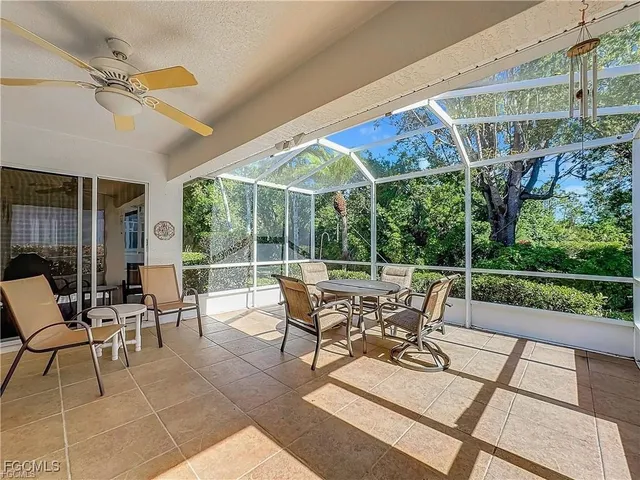an aerial view of a house with a lake view