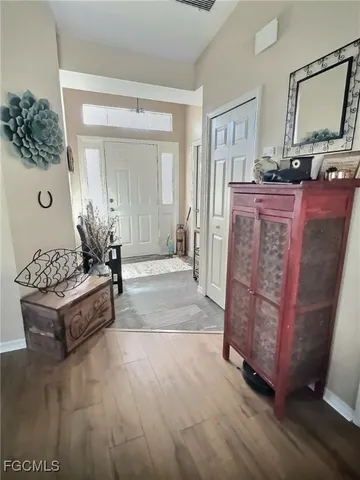 a kitchen with sink cabinets and stove top oven