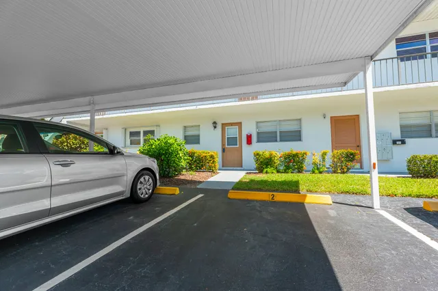 a car parked in front of a house