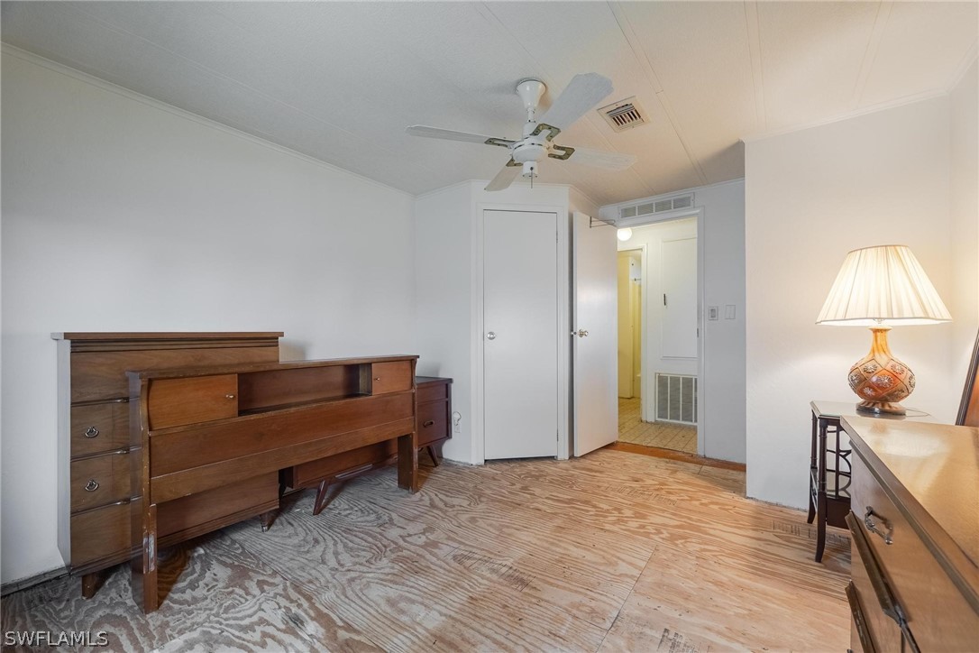 27 Aloe Alva, FL 33920 - Photo 15 of 33 a bedroom with furniture and a mirror