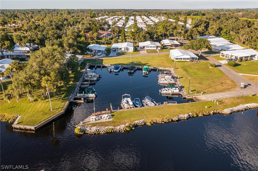 27 Aloe Alva, FL 33920 - Photo 2 of 33 an aerial view of residential houses with outdoor space