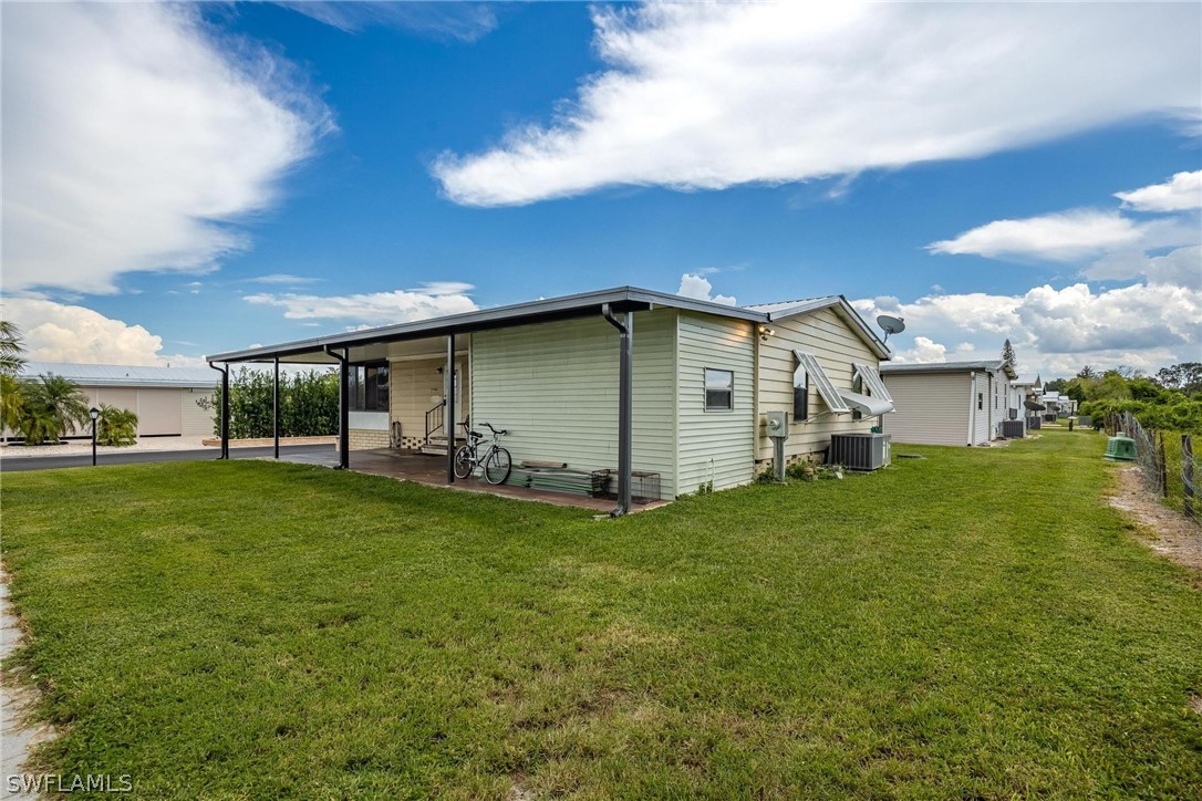 27 Aloe Alva, FL 33920 - Photo 24 of 33 a view of a back yard of the house