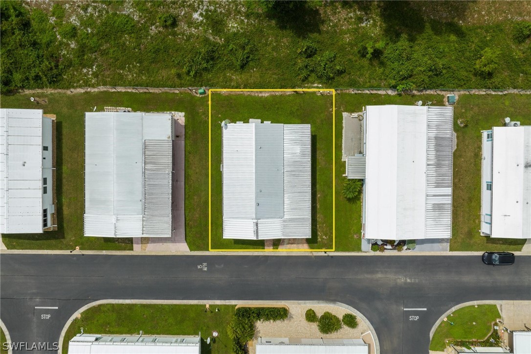 27 Aloe Alva, FL 33920 - Photo 25 of 33 a view of two chair and a potted plant