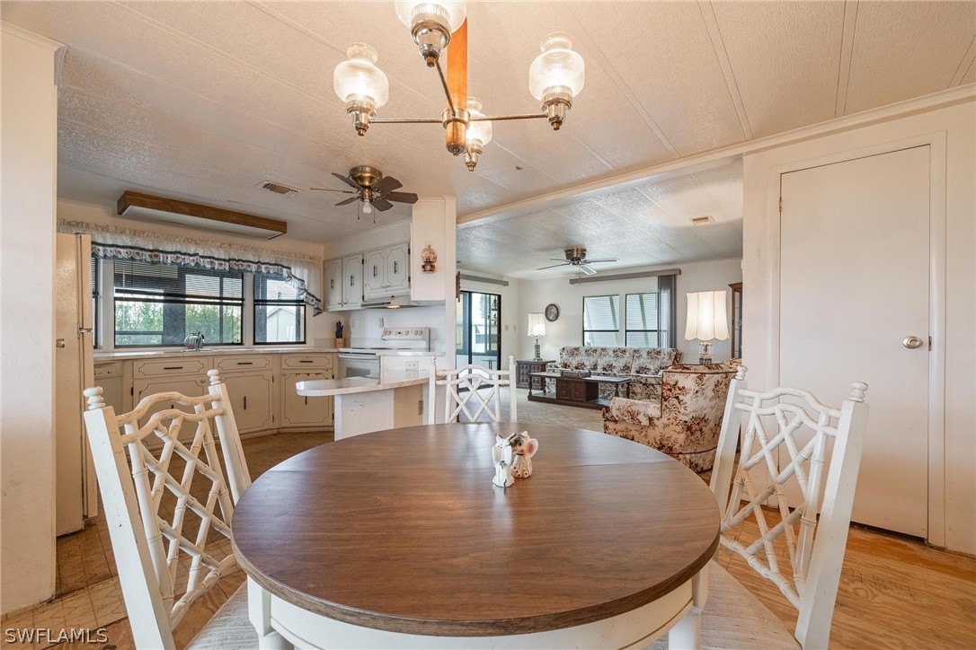 27 Aloe Alva, FL 33920 - Photo 9 of 33 a view of a dining room with furniture