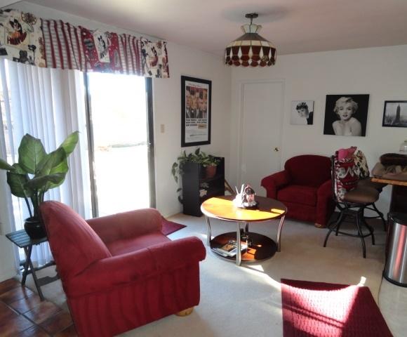 2175 Lariat Road Sedona, AZ 86336 - Photo 8 of 10 a living room with furniture and a window