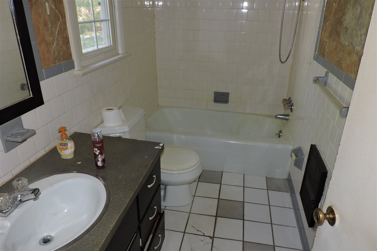 2134 Mt Torrey Road Lyndhurst, VA 22952 - Photo 13 of 32 a bathroom with a sink a toilet and shower