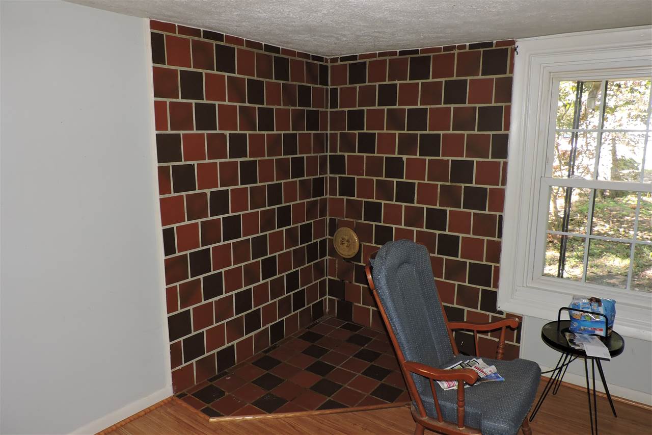 2134 Mt Torrey Road Lyndhurst, VA 22952 - Photo 22 of 32 a view of a chair and wooden floor in a room