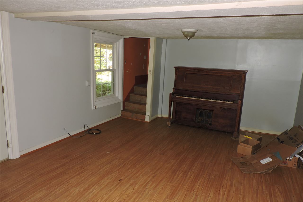 2134 Mt Torrey Road Lyndhurst, VA 22952 - Photo 23 of 32 a view of a livingroom with wooden floor and a window