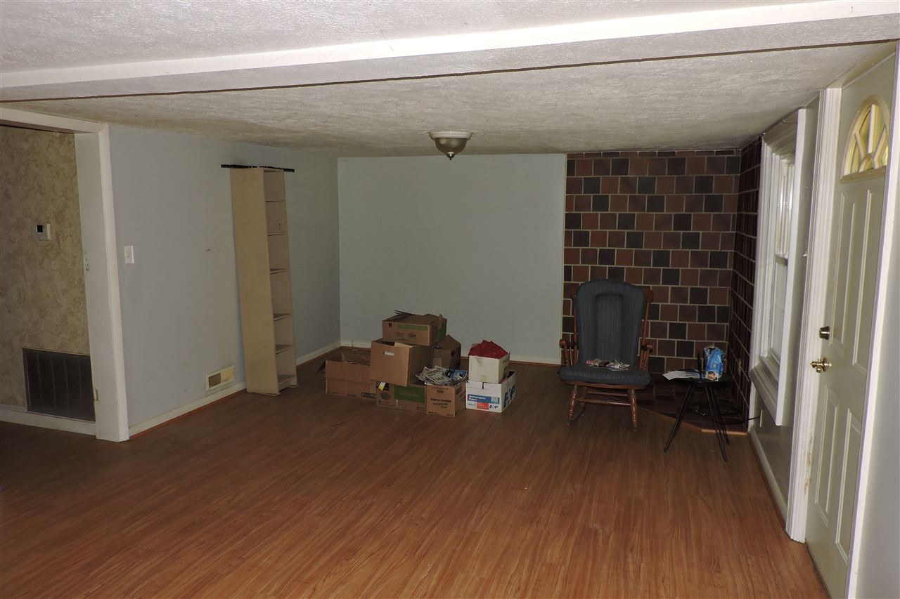 2134 Mt Torrey Road Lyndhurst, VA 22952 - Photo 25 of 32 a living room with furniture and a wooden floor