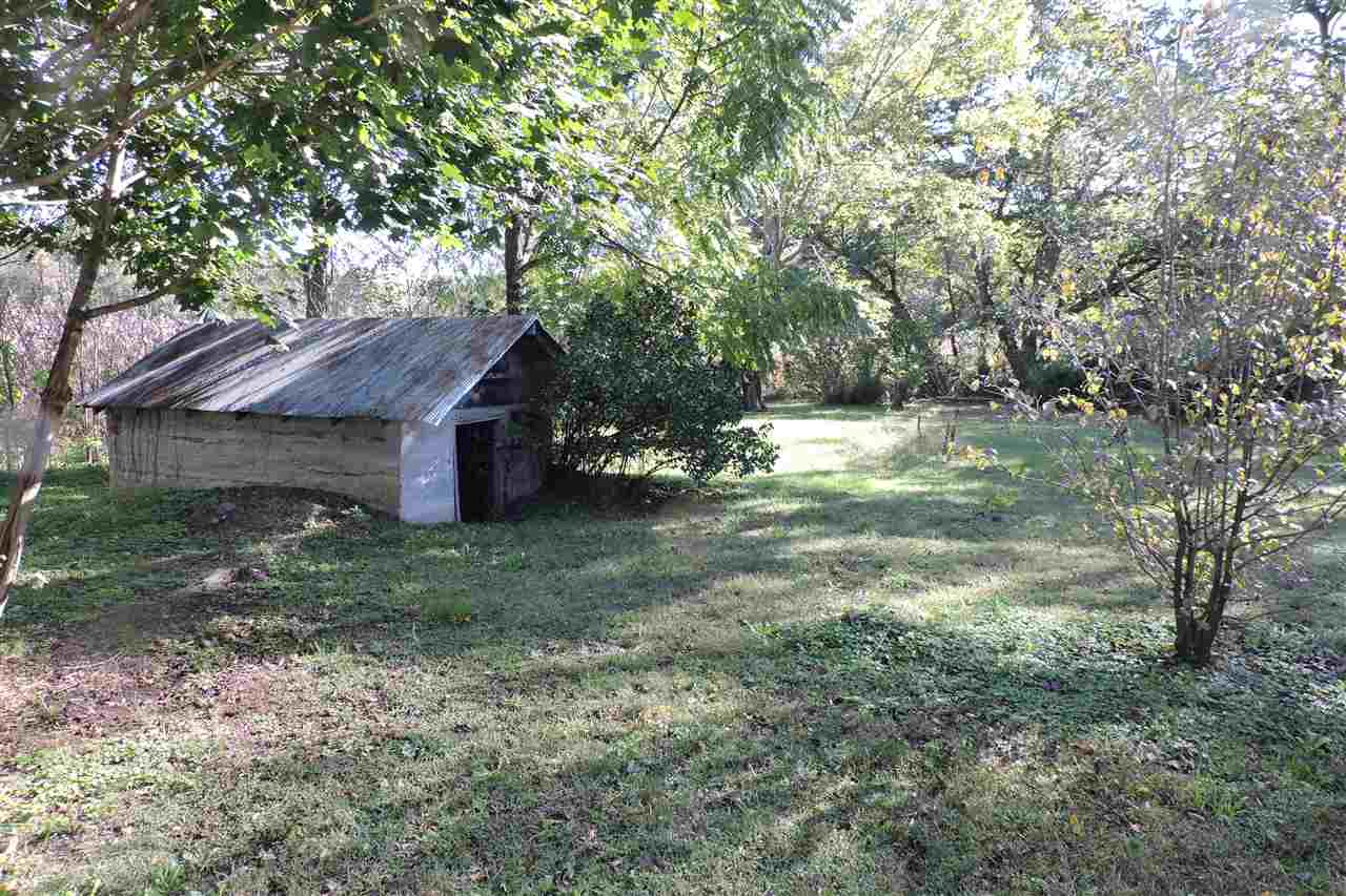 2134 Mt Torrey Road Lyndhurst, VA 22952 - Photo 4 of 32 a view of a barn house in the middle of a forest