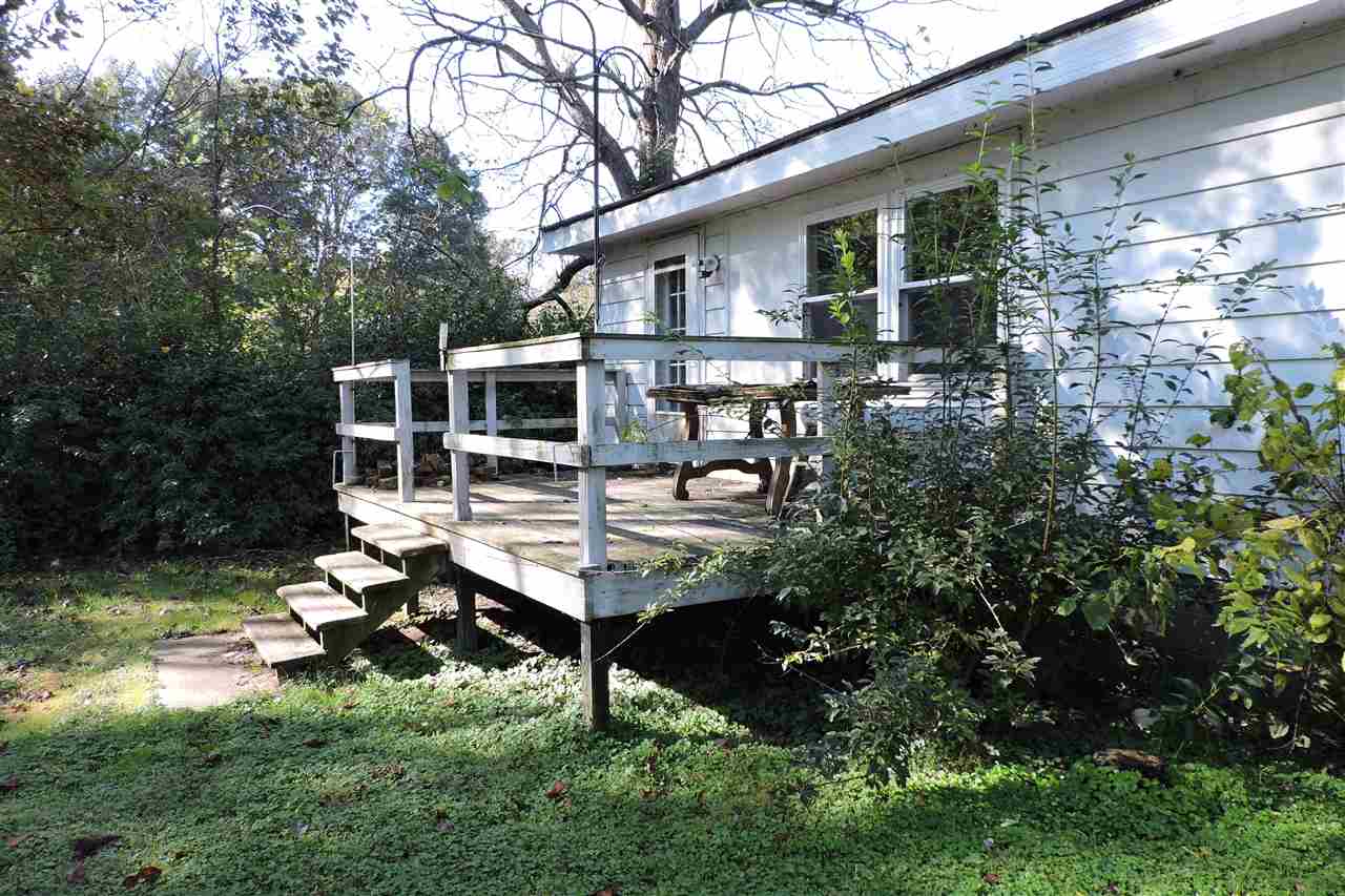 2134 Mt Torrey Road Lyndhurst, VA 22952 - Photo 7 of 32 a backyard of a house with table and chairs