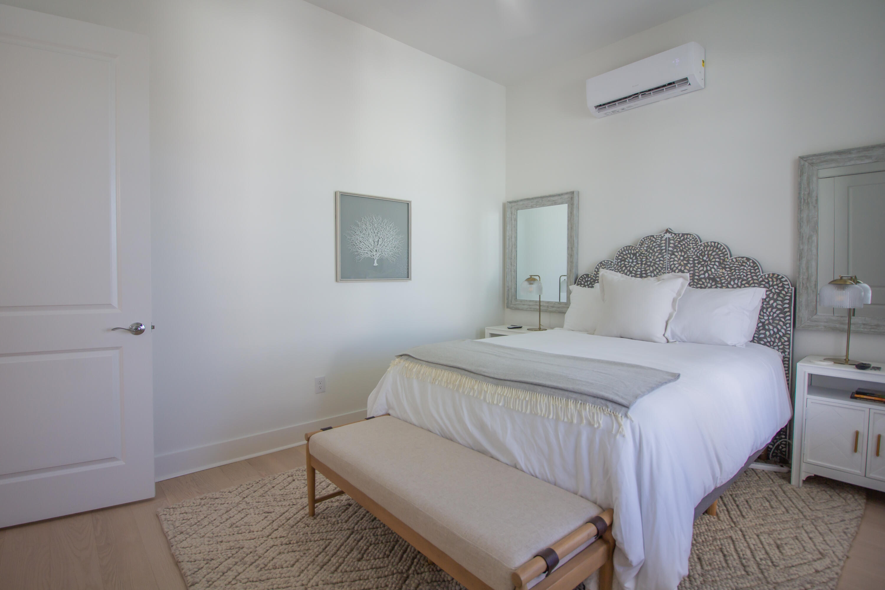 141 Valdare Ln Inlet Beach Inlet Beach, FL 32461 - Photo 13 of 55 a bedroom with a bed and a mirror