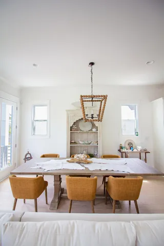 a large kitchen with kitchen island a sink stainless steel appliances and cabinets