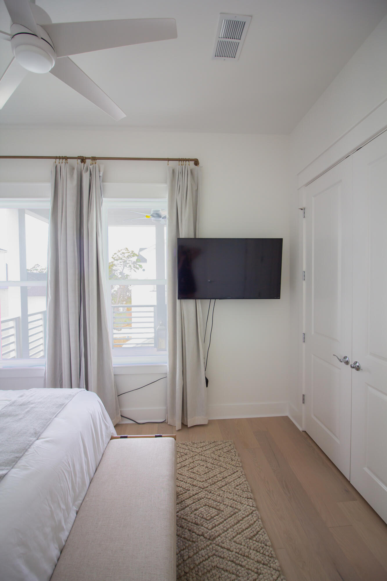 141 Valdare Ln Inlet Beach Inlet Beach, FL 32461 - Photo 44 of 55 a view of a bedroom with a bed and a window