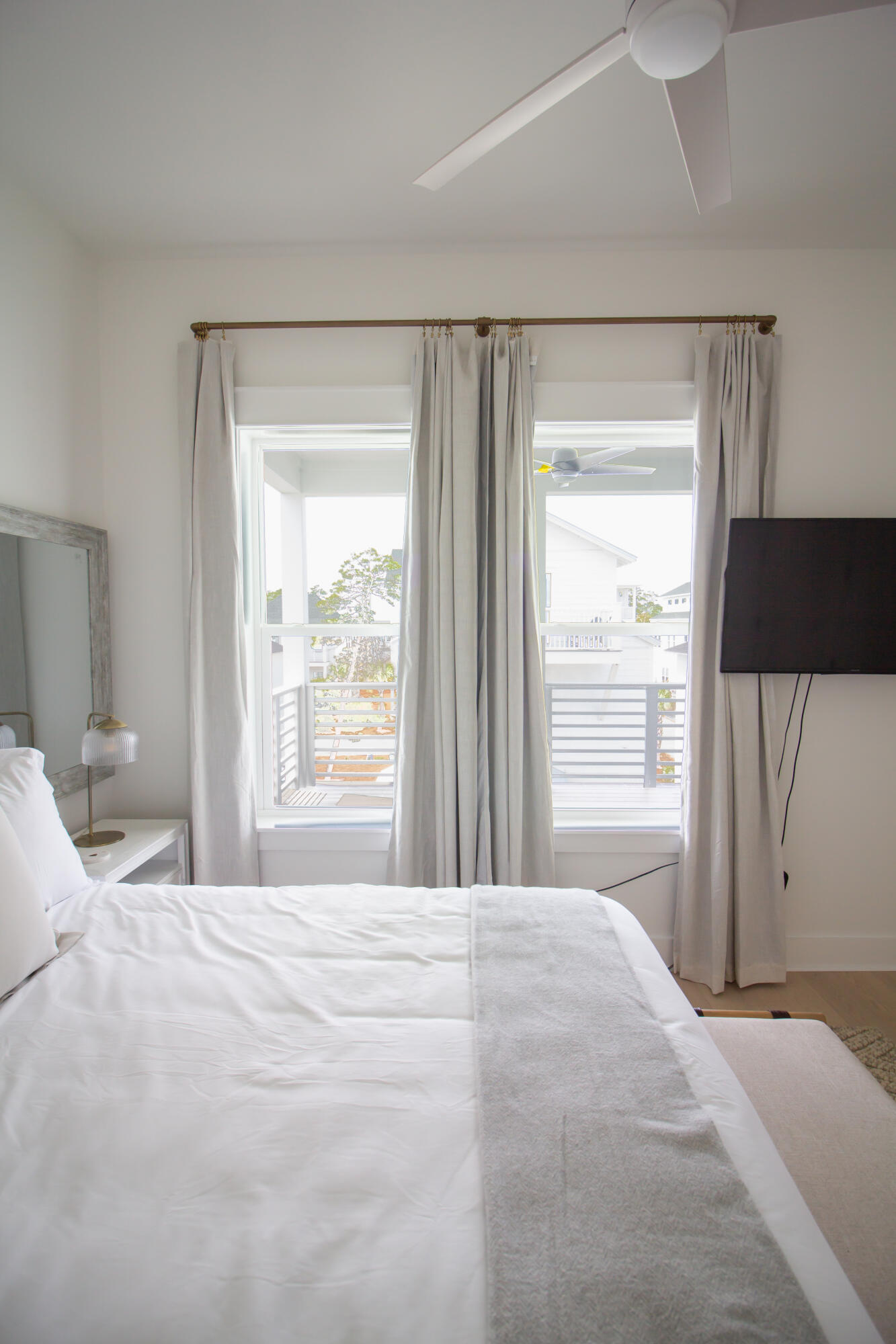 141 Valdare Ln Inlet Beach Inlet Beach, FL 32461 - Photo 47 of 55 a bedroom with a large bed and a window