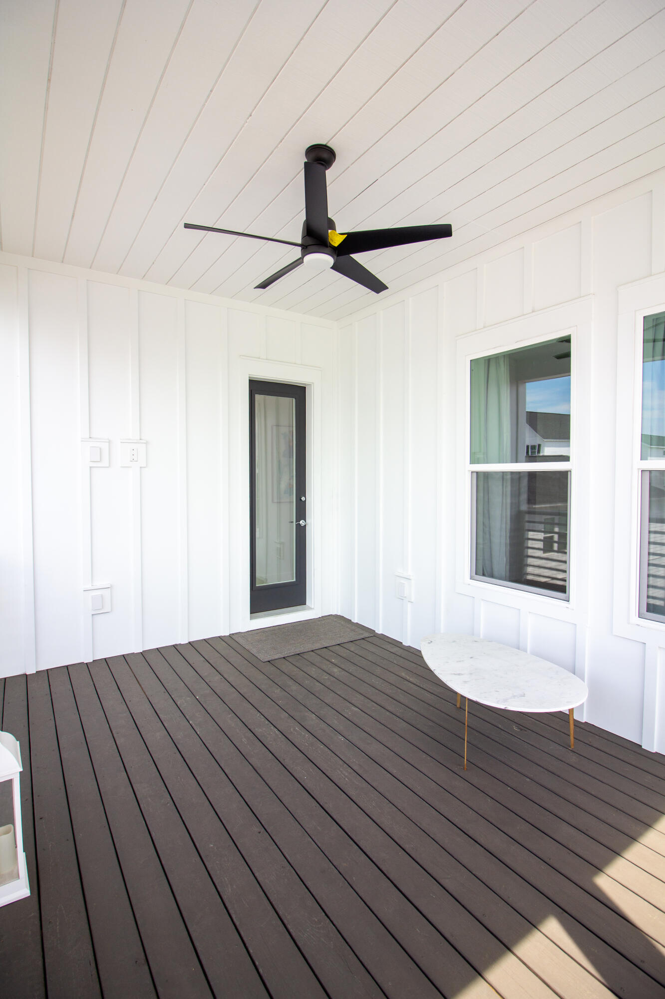 141 Valdare Ln Inlet Beach Inlet Beach, FL 32461 - Photo 48 of 55 a view of empty room with wooden floor and fan