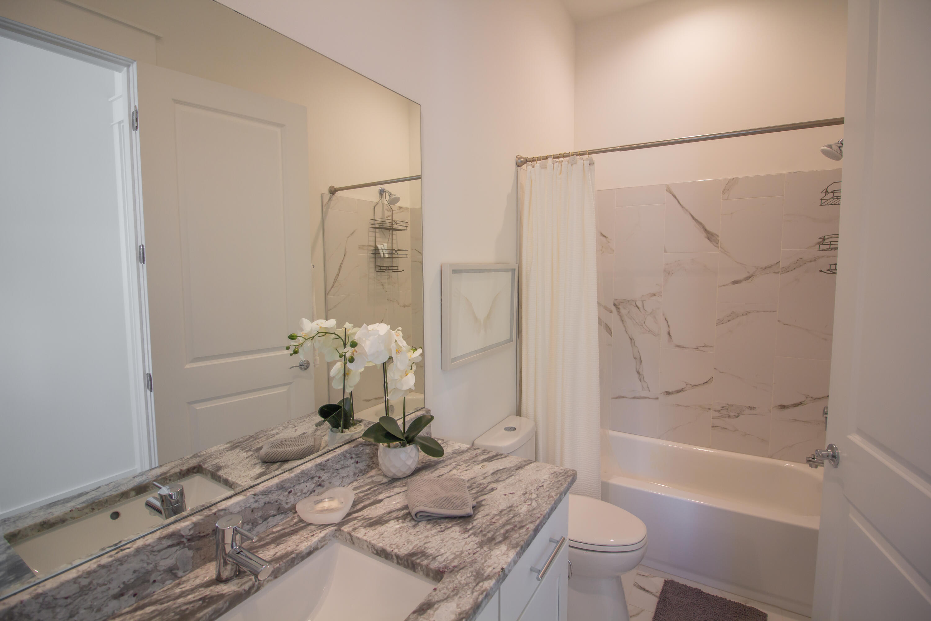 141 Valdare Ln Inlet Beach Inlet Beach, FL 32461 - Photo 8 of 55 a bathroom with a granite countertop sink toilet and shower