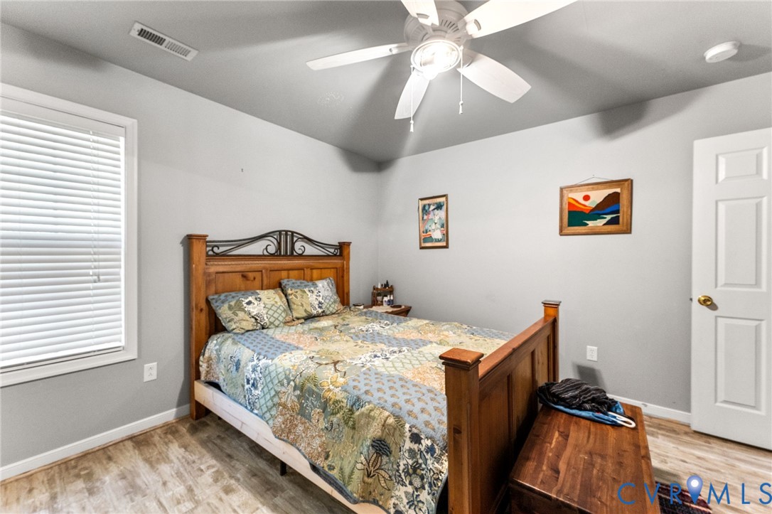 3120 Denise Road Petersburg, VA 23805 - Photo 50 of 51 Bedroom featuring wood-finish flooring, a ceiling