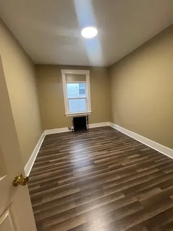 a kitchen with a stove and a refrigerator