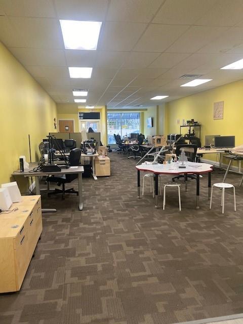 568 Merchant Street Ambridge, PA 15003 - Photo 4 of 20 a group of people sitting in a living room