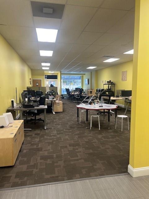 568 Merchant Street Ambridge, PA 15003 - Photo 6 of 20 a living room with lots of furniture and kitchen view