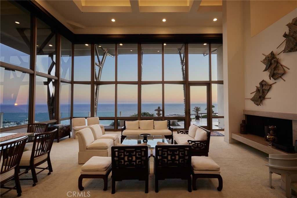 1513 Emerald Bay Laguna Beach, CA 92651 - Photo 11 of 44 a very nice looking living room with furniture and a fireplace