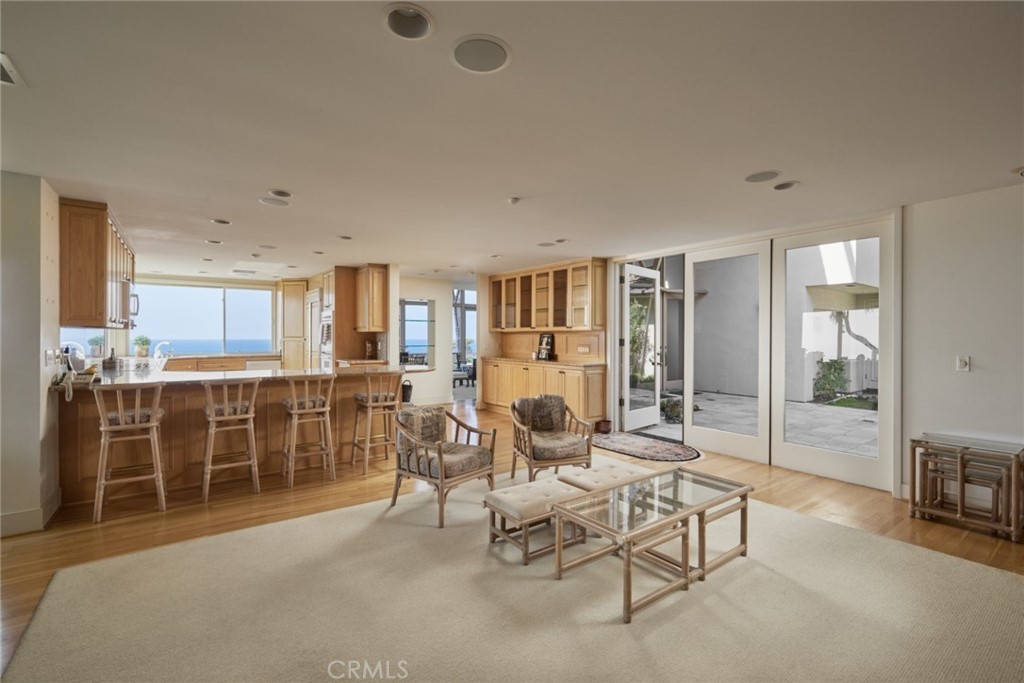 1513 Emerald Bay Laguna Beach, CA 92651 - Photo 23 of 44 a living room with furniture a flat screen tv and windows