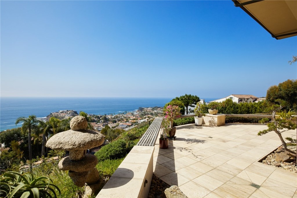 1513 Emerald Bay Laguna Beach, CA 92651 - Photo 36 of 44 a view of a swimming pool and lounge chair