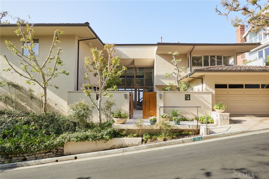 1513 Emerald Bay Laguna Beach, CA 92651 - Photo 5 of 44 front view of a building with a street