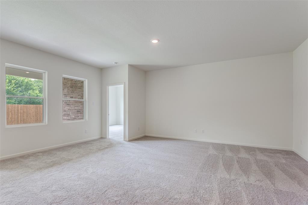 41 Glen Crossings Road Fort Worth, TX 76134 - Photo 5 of 12 an empty room with windows