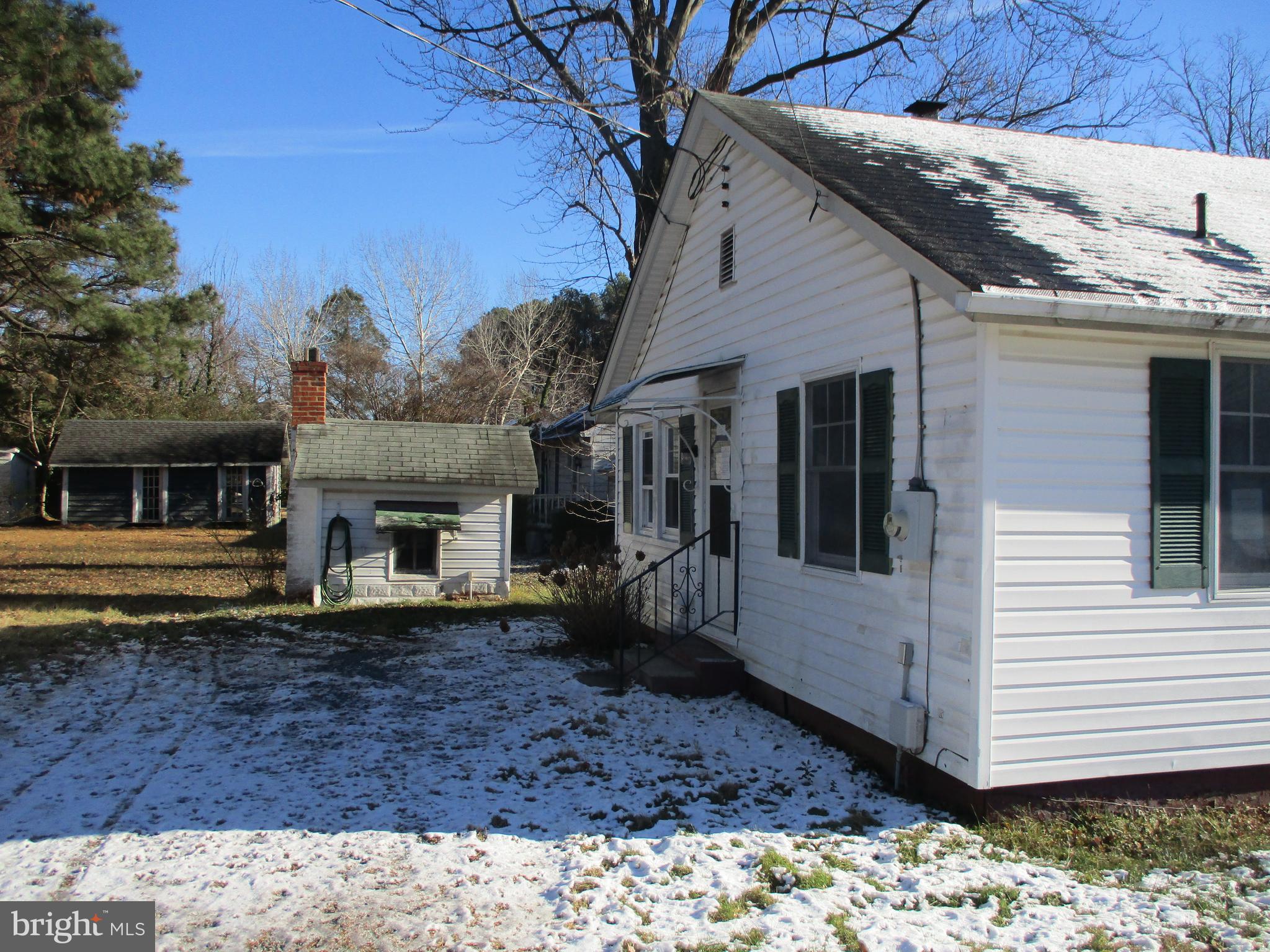 6369 Neavitt Manor Road Neavitt, MD 21652 - Photo 2 of 10 a view of a house with a yard