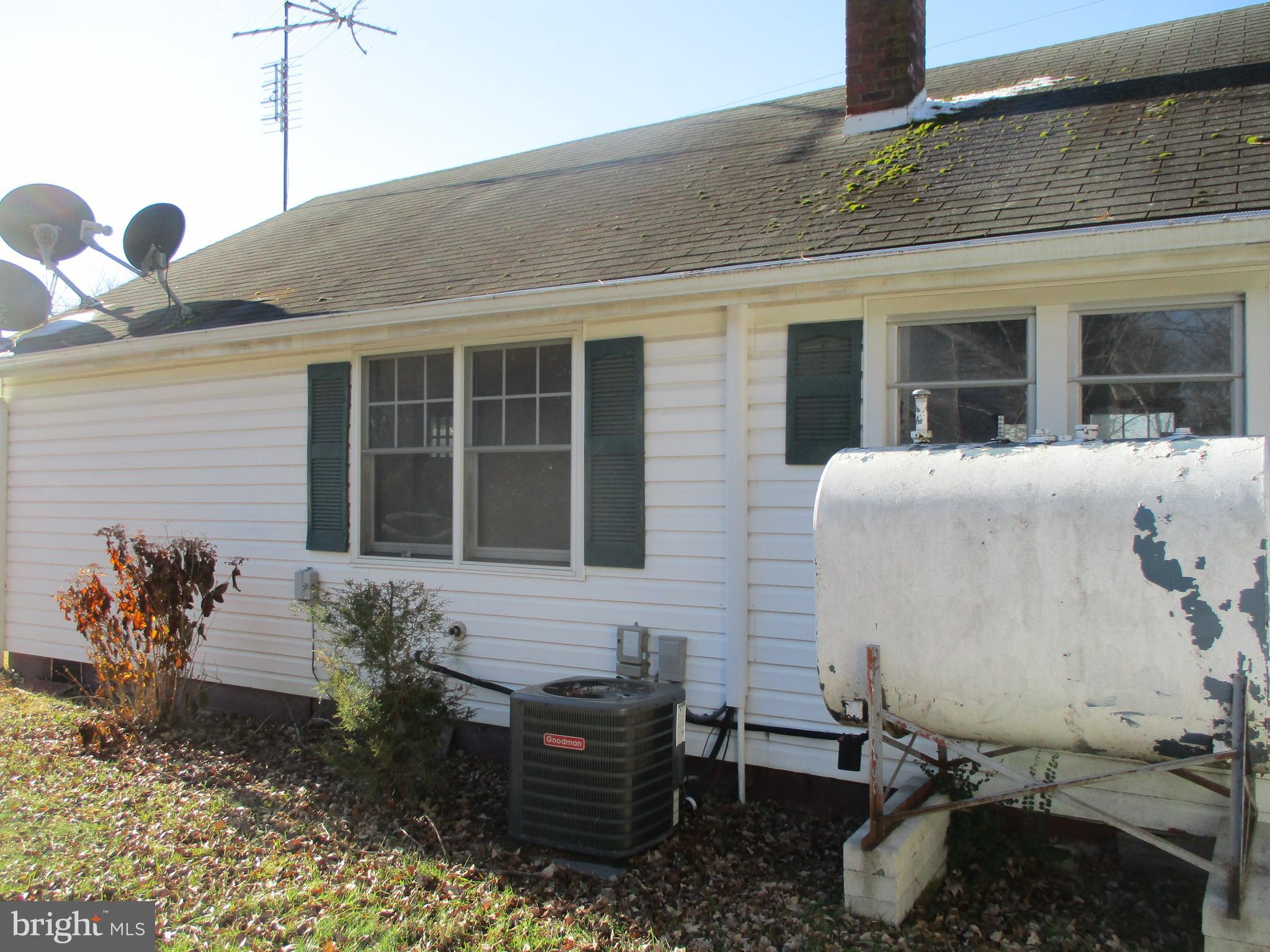 6369 Neavitt Manor Road Neavitt, MD 21652 - Photo 3 of 10 a front view of a house with outdoor seating