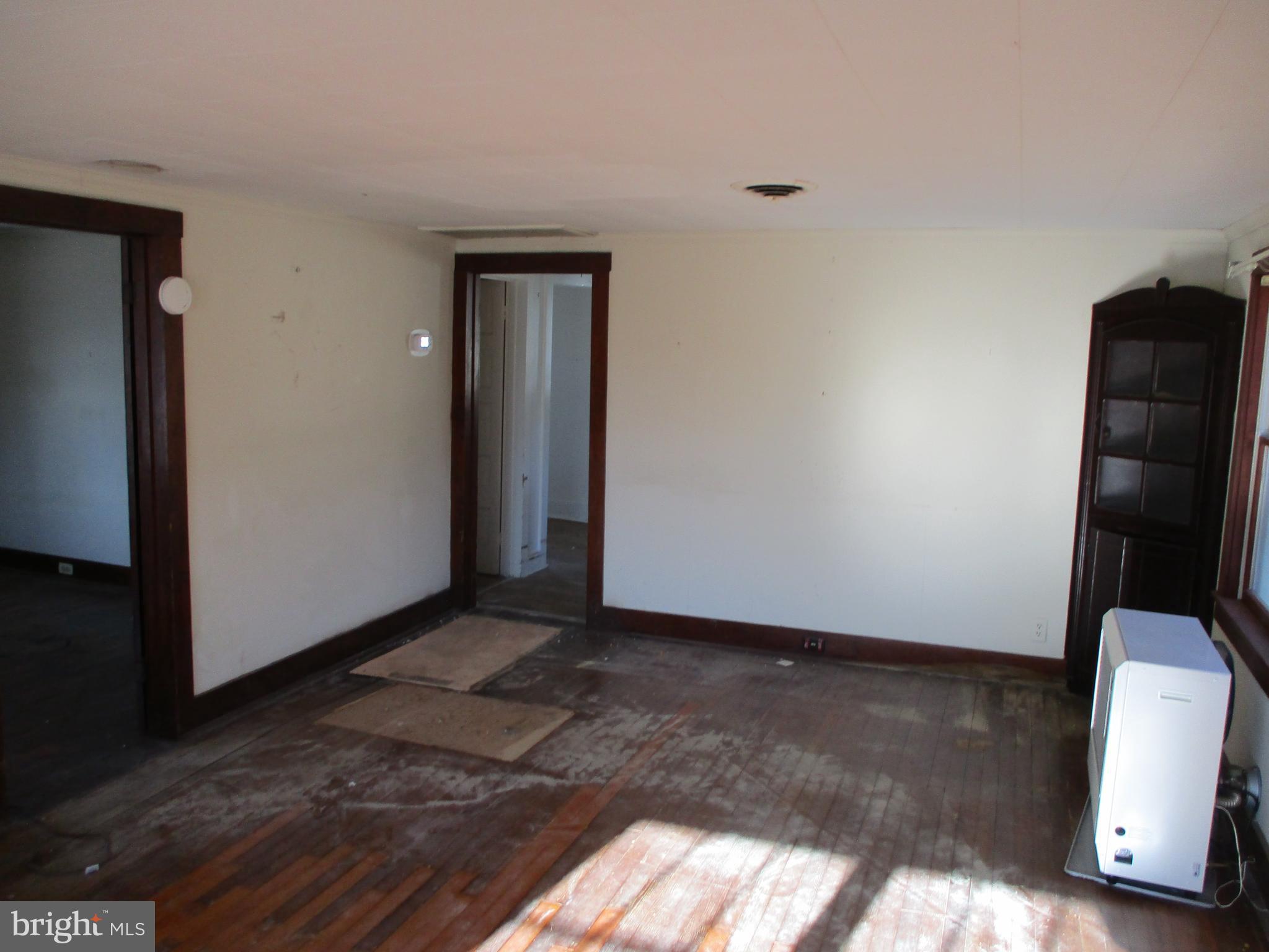6369 Neavitt Manor Road Neavitt, MD 21652 - Photo 9 of 10 a view of an empty room and wooden floor