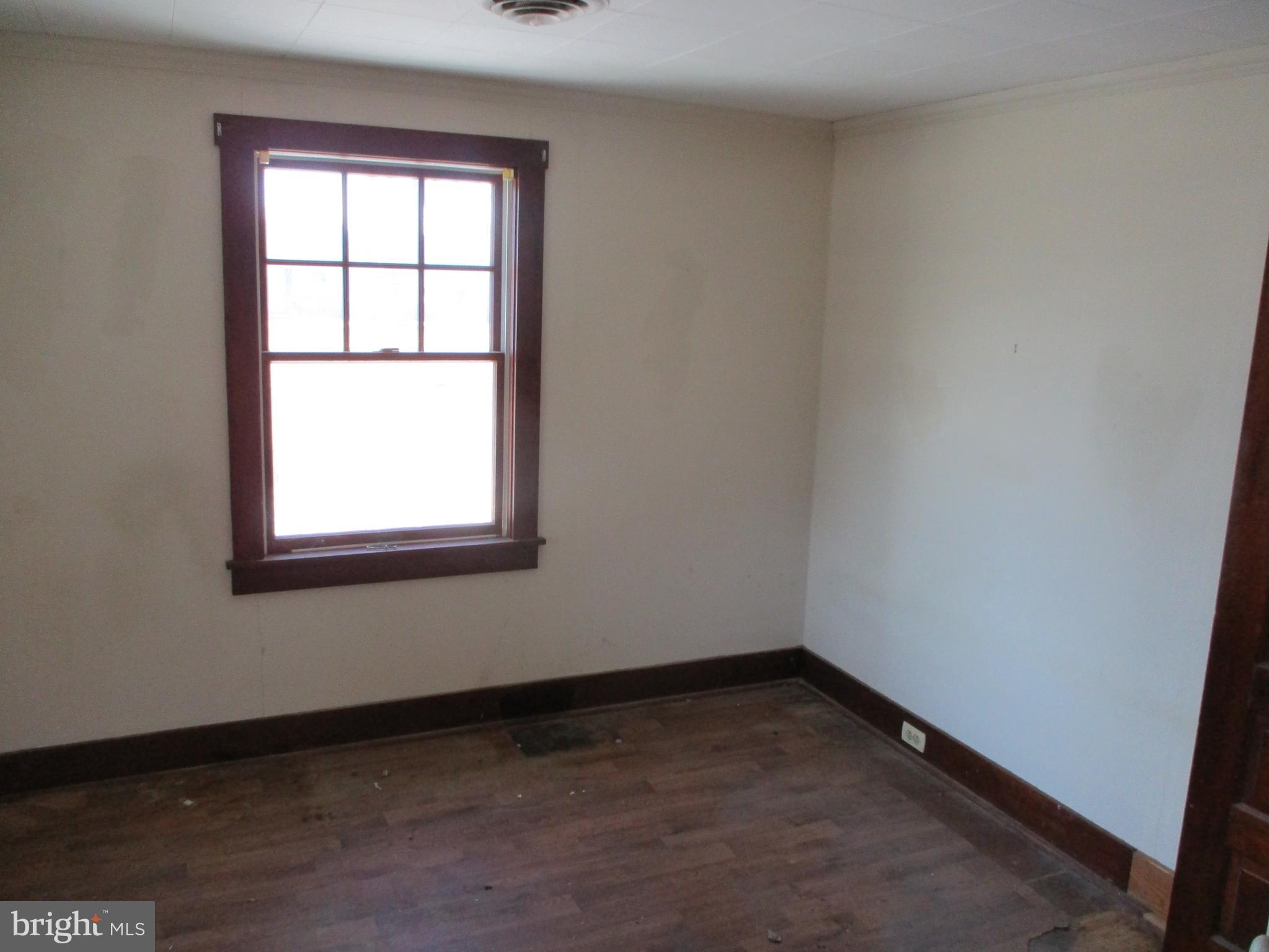 6369 Neavitt Manor Road Neavitt, MD 21652 - Photo 10 of 10 an empty room with a window