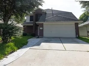 a front view of house with yard
