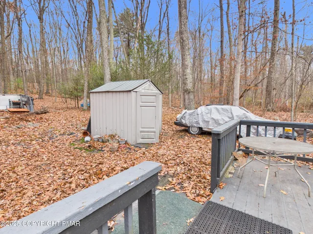 a view of a backyard of the house