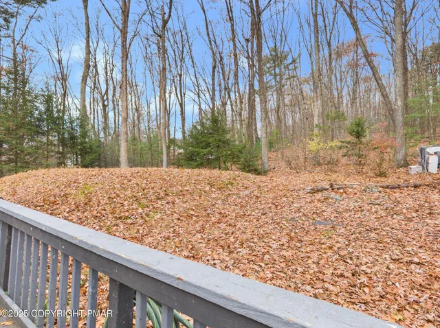a view of a backyard of the house