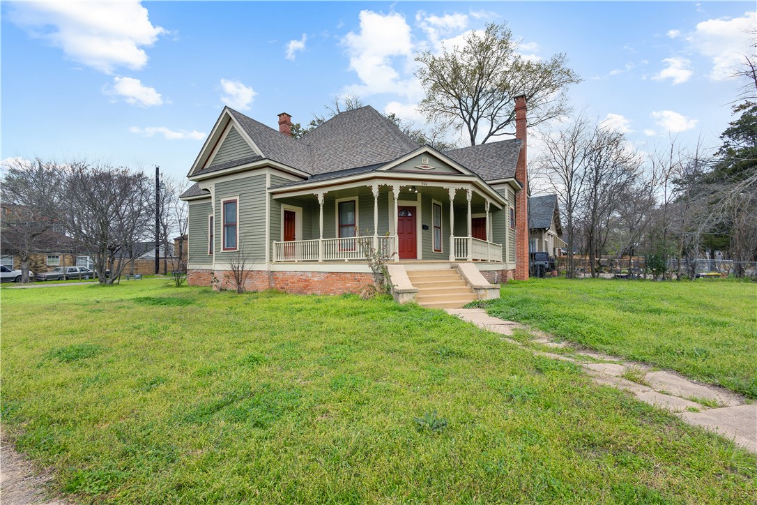 500 North Washington Avenue Bryan, TX 77803 - Photo 2 of 15 a front view of a house with a yard