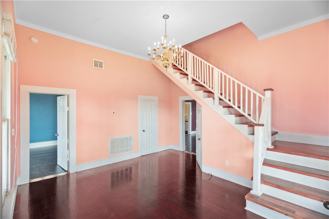 500 North Washington Avenue Bryan, TX 77803 - Photo 3 of 15 a view of entryway and hall with wooden floor
